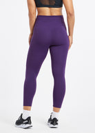 Essential Bird 3/4 length Running Tights in Twilight purple, back view